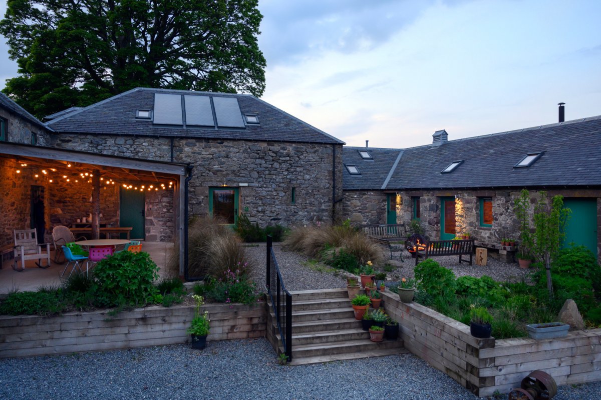 Burmieston - the courtyard lit up for some drinks outside